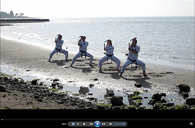 Slow motion video of traditional nunchuka kata by representatives of Ueshiro Shorin-Ryu USA.  Performed July 14, 2013 at Sherwood Is. Beach.  